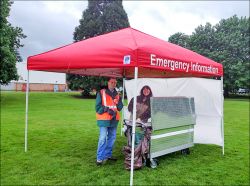 Figure 12: This canopy has one of the white sidewalls affixed.