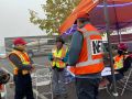 Michael Schilmoeller (in the cowboy hat) giving a briefing to start one of the graveyard shifts he led. September 12 2020, photo by Ethan Jewett.