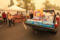 Donations of bottled water arriving at the evacuation site. September 12 2020, photo by Ernest Jones.