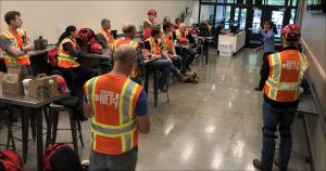 Alice Busch delivering a Prep and Safety Briefing to Players during Operation Watzek. September 22, 2018.